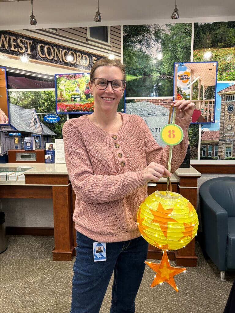 Marlene Cassidy at Doe + Fawn shows off the lantern that will be at her store to go with Art for All’s Garden deLights Treasure Hunt in collaboration with the Hidden Treasures Festival. Courtesy photo