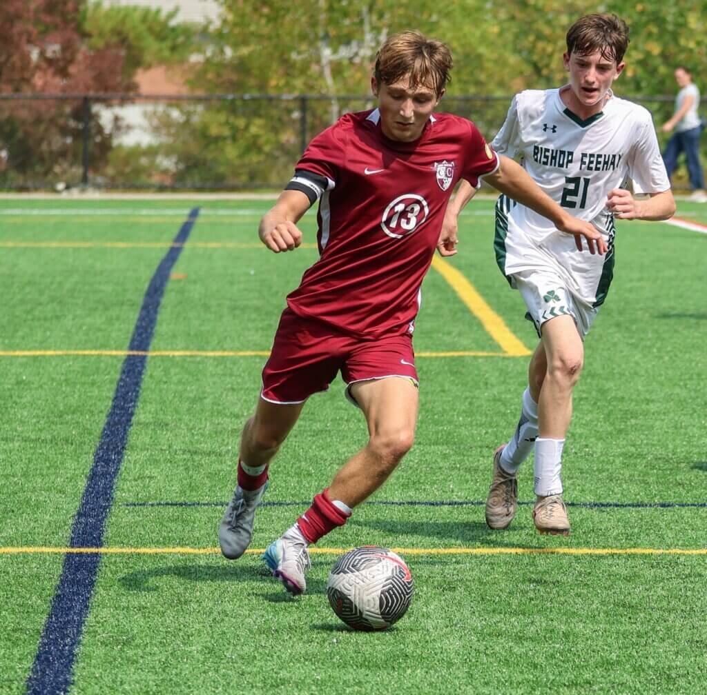 Chris Rigazio outmaneuvers an opponent. Photo by Rebecca Woodward