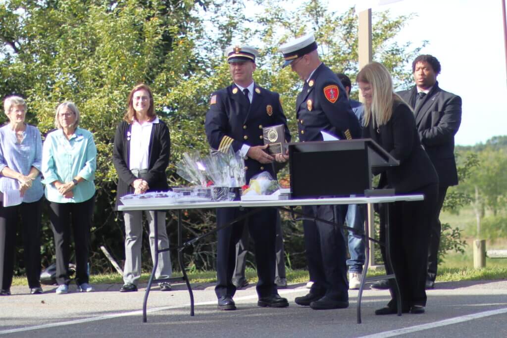 Acton Fire Chief Brian Whitney presents the Al Filipov Award to Assistant Fire Chief Sean Murphy. Photo: Trace Salzbrenner/The Acton Bridge