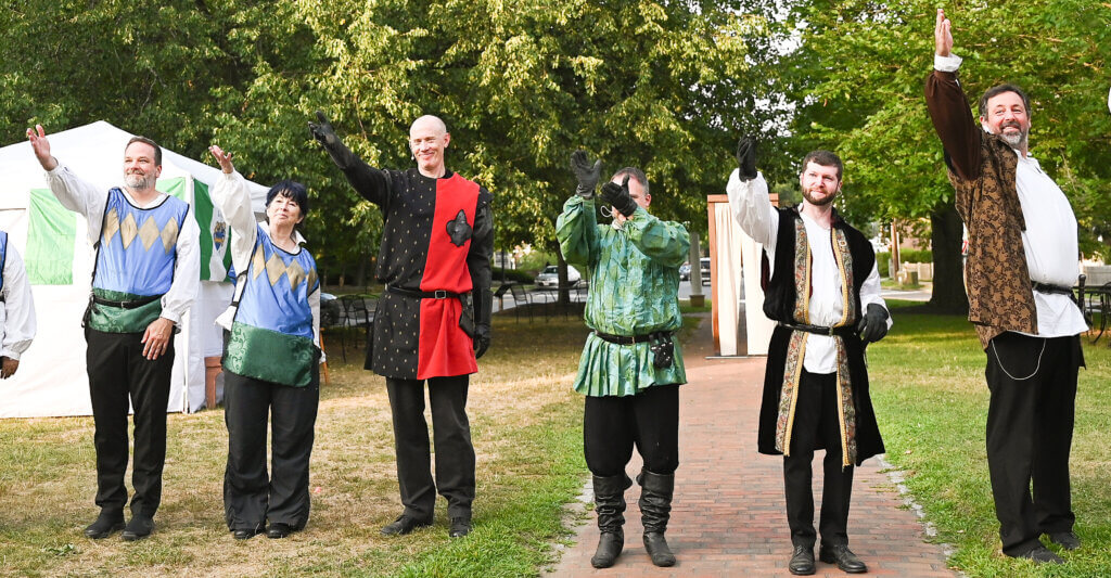 The World’s A Stage Players salute the audience after their performance of William Shakespeare’s “Henry IV, Part I” on the Acton Free Public Library lawn on Saturday, July 26, 2025. Two more outdoor performances are scheduled for August 2 and 3 at the library. Ken McGagh/The Acton Bridge