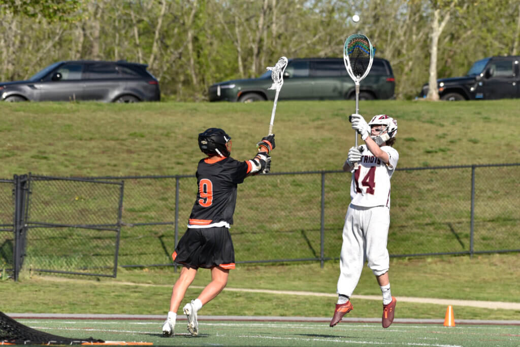 Goalie Jake Huff passes the ball. Photo by Cris Van Dyke