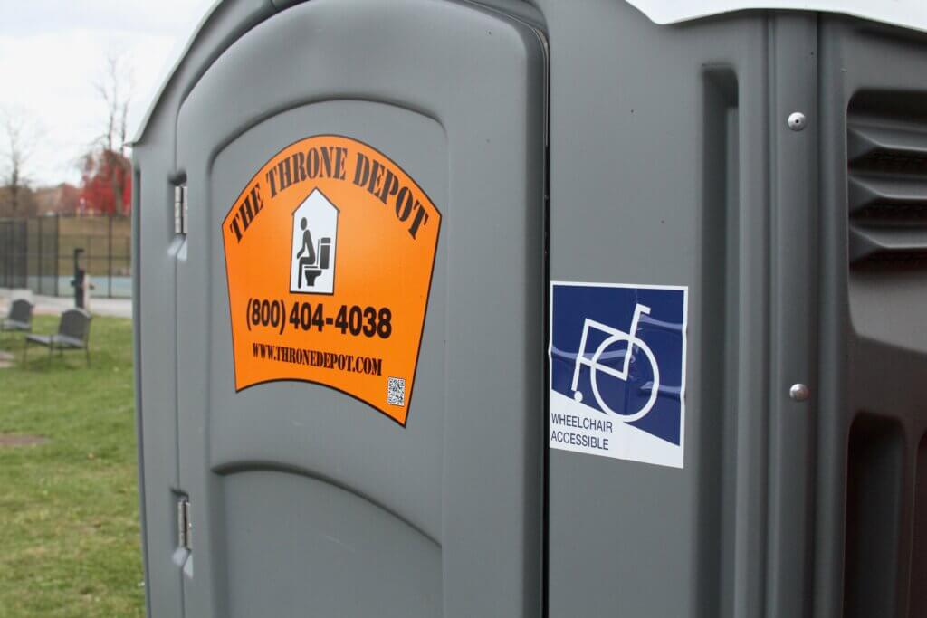 CCHS has an “accessible” portable toilet at Memorial Field — but advocates agree it isn’t actually suitable for many people with disabilities. Photo: Dakota Antelman/The Acton Bridge