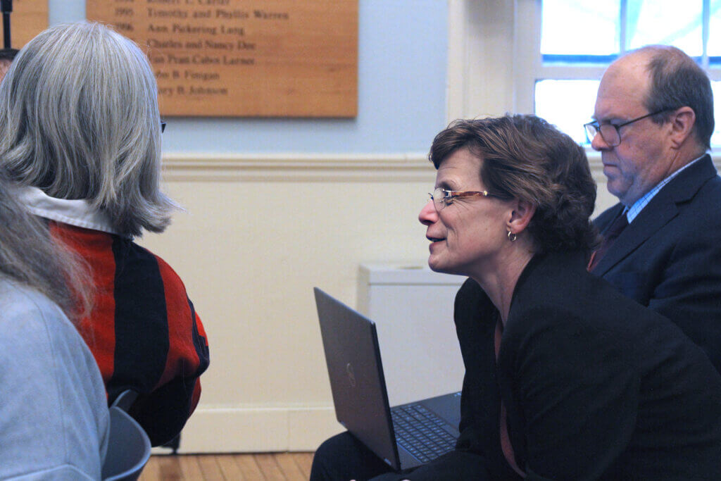  Schools Superintendent Laurie Hunter speaks to Acton-Carlisle School Committee chair Julie Viola during an April 15 Finance Committee meeting. Photo: Dakota Antelman/The Acton Bridge