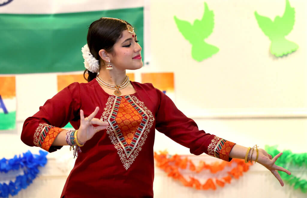 Laiya Pavlov, 17, a rising senior at Acton-Carlisle High School, performs a traditional Indian dance during Acton's second annual India Day celebration at First Parish on August 16, 2025,