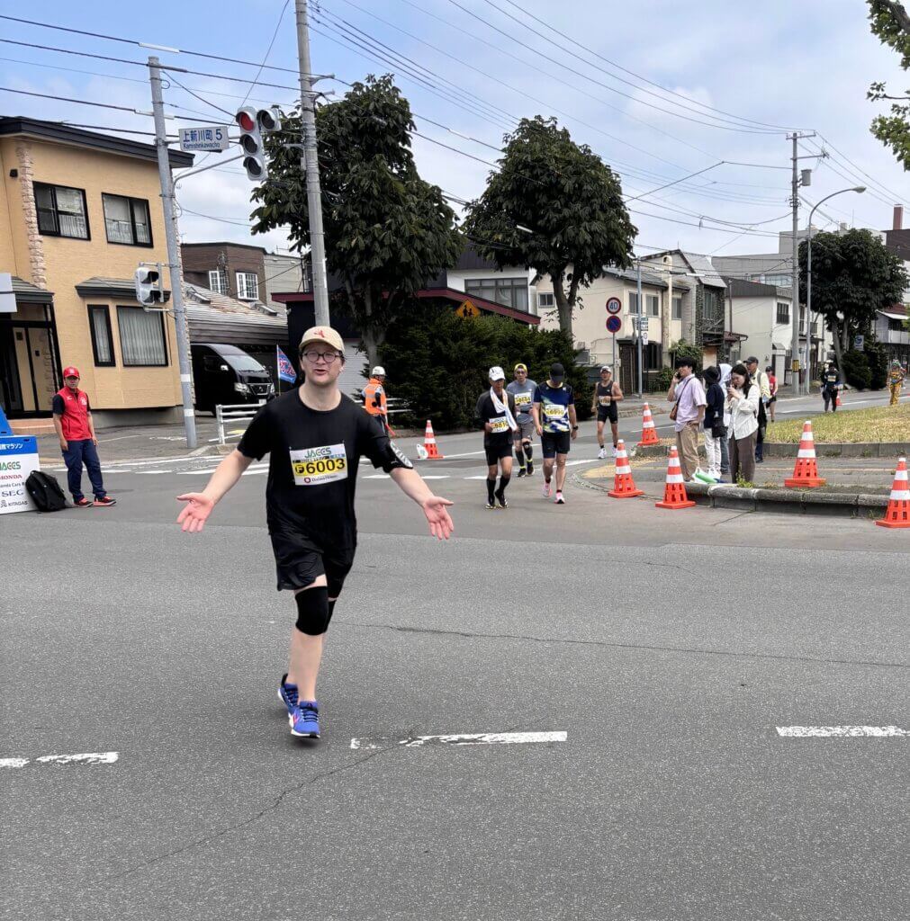 The author, moments after his headphones conked out early in the marathon. Photo courtesy of Jack Brox McCarthy