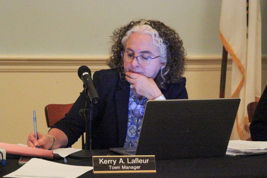 Town Manager Kerry Lafleur takes notes during Monday’s Select Board meeting. Photo: Dakota Antelman/The Acton Bridge