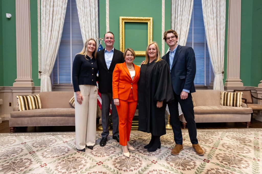 Mary “Polly” Phillips and her family with Gov. Maura Healey. Courtesy photo