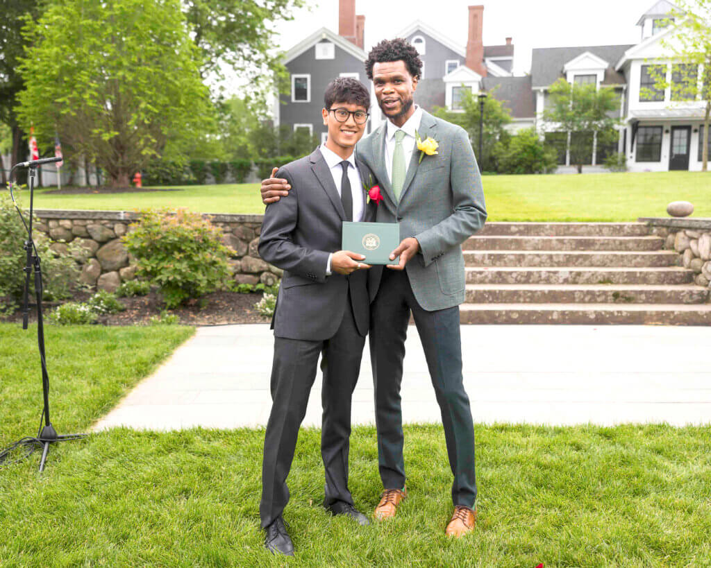 Avi Cariens of Acton, a new graduate of Acton Academy in May, pictured with Henry Fairfax, head of school. Courtesy photo