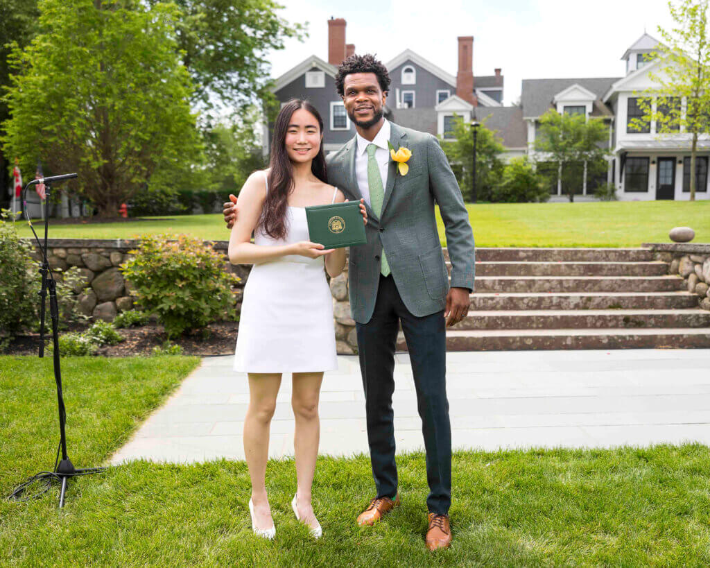 Acton Academy Graduate Aurora Hao of Acton with Head of School Henry Fairfax after receiving her diploma. Courtesy photo