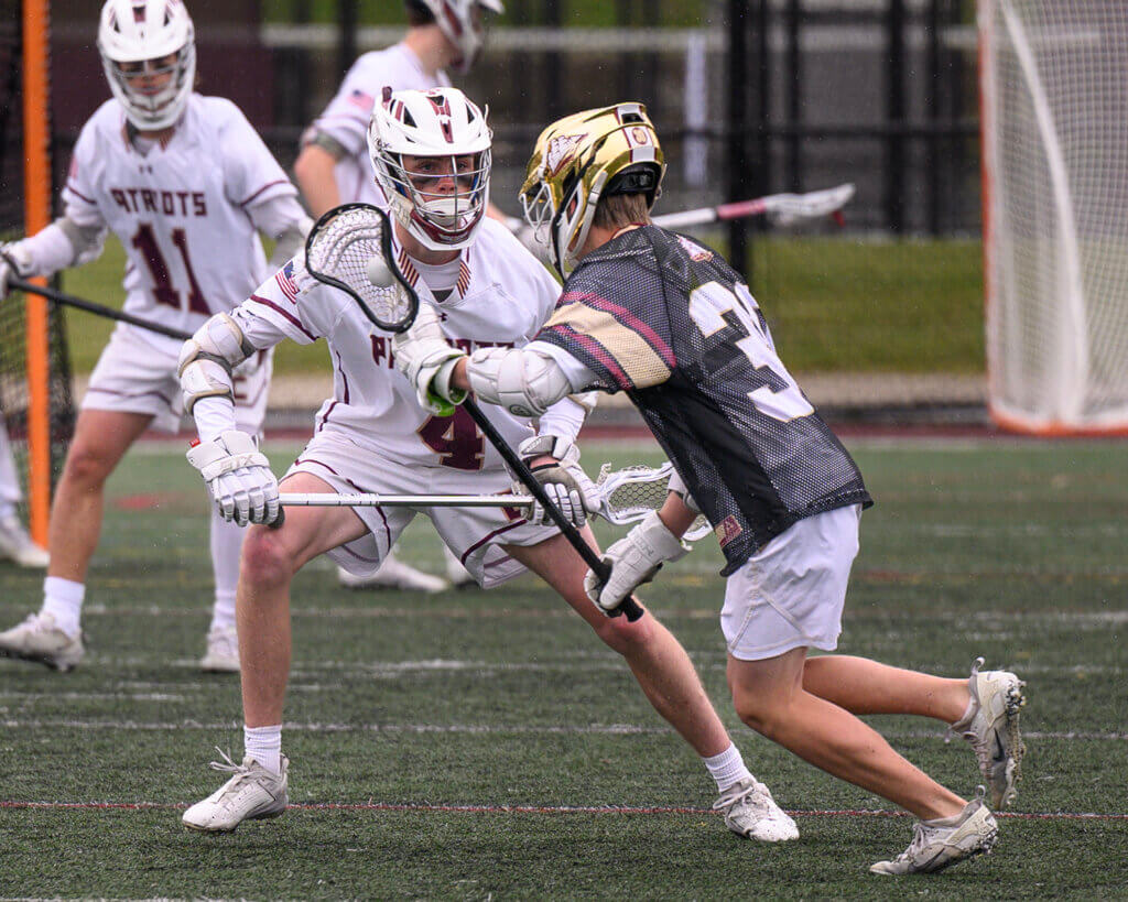 CCHS’ Will Steffens (No. 4) defends Newburyport’s Lucas Shorten (No. 30) during last Saturday’s Senior Day game. Photo by Jon Straggas