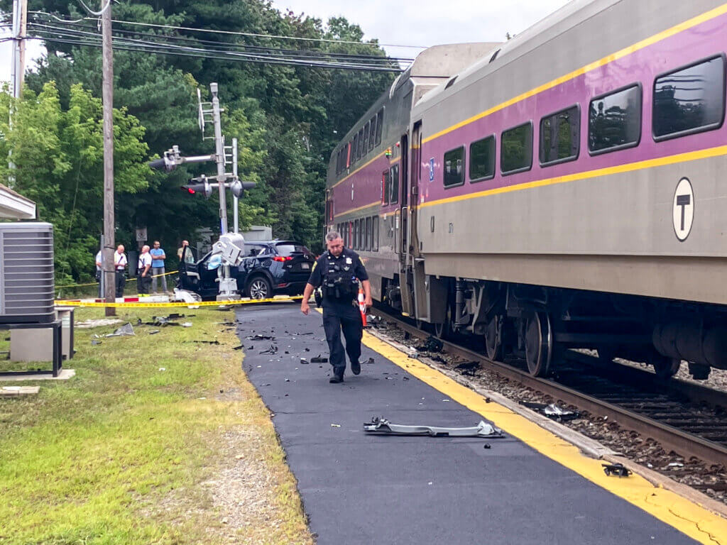 Police survey the damage from a train/car collision in Acton on Monday afternoon. Photo: Dakota Antelman/The Acton Bridge