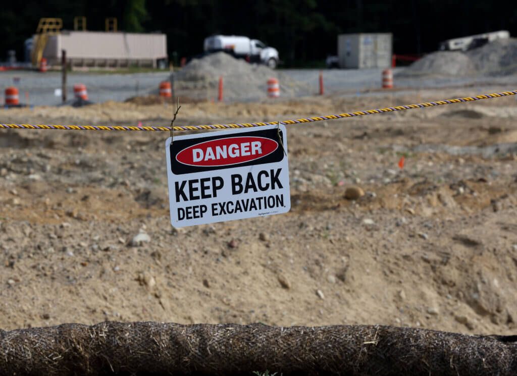 Sign posted in front of an excavation area at the 2229 Main Street Superfund Site in Acton on Wednesday, August 13, 2025. Ken McGagh/The Acton Bridge