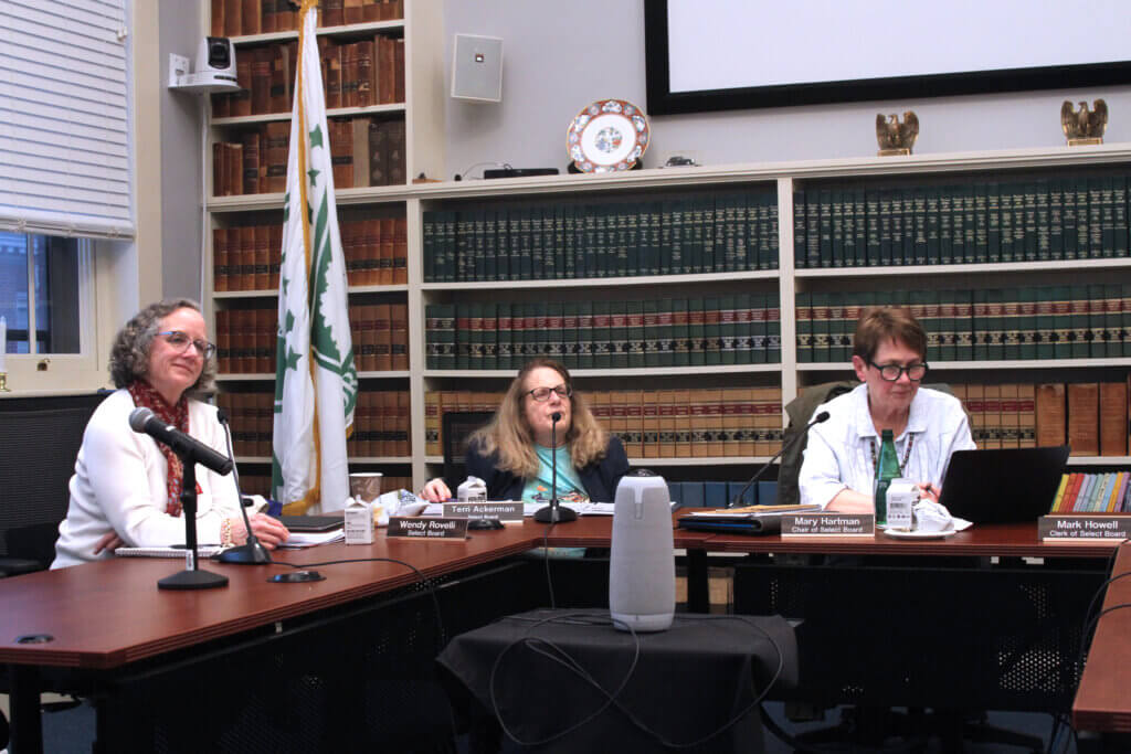 Select Board member Terri Ackerman (center) celebrated the expanded Minuteman Bike Share program, but flagged high costs during a March 17 discussion with Deputy Town Manager Megan Zammuto. Photo: Dakota Antelman/The Acton Bridge