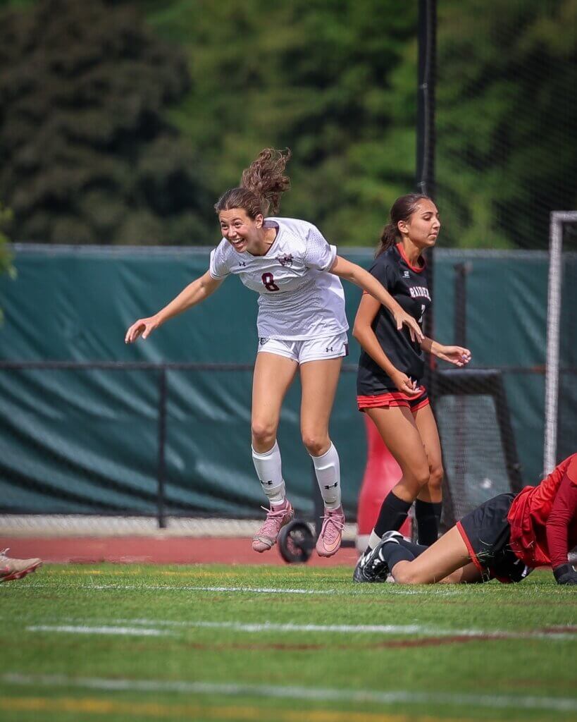 Fiona Forte celebrates her goal in the Patriots’ 4-0 win over Wellesley on September 19. Photo by Janel Apuna