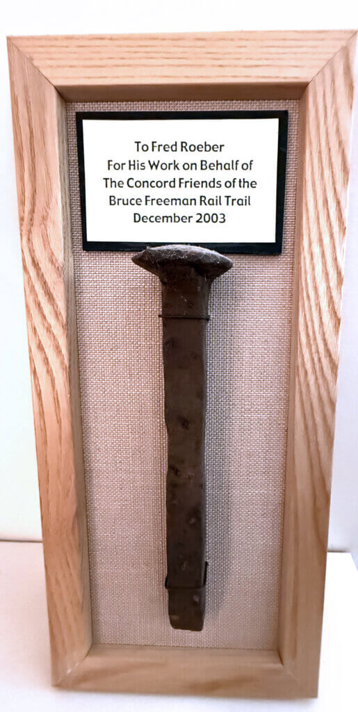 3. Rober received a commemorative nail for his help with the Bruce Freeman Rail Trail. Courtesy photo