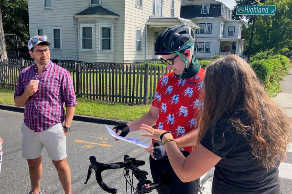 Cyclist Chris Arthur reviews pocket park concepts during an informational “open house.” Photo: Dakota Antelman/The Acton Bridge