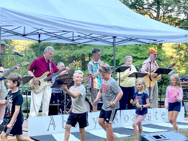 Children break into dance during a recent concert on Annursnac Hill Road. Courtesy photo