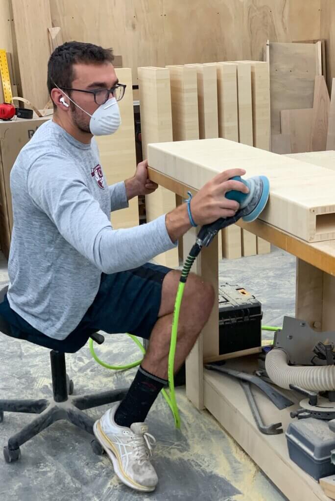 Moving construction materials and machines, installing the ventilation system, building, sanding, finishing and installing hardware on all of the cabinetry and stairs, running the low-voltage wiring, 3D printing needed parts, are just some of the tasks performed by the family “crew.”