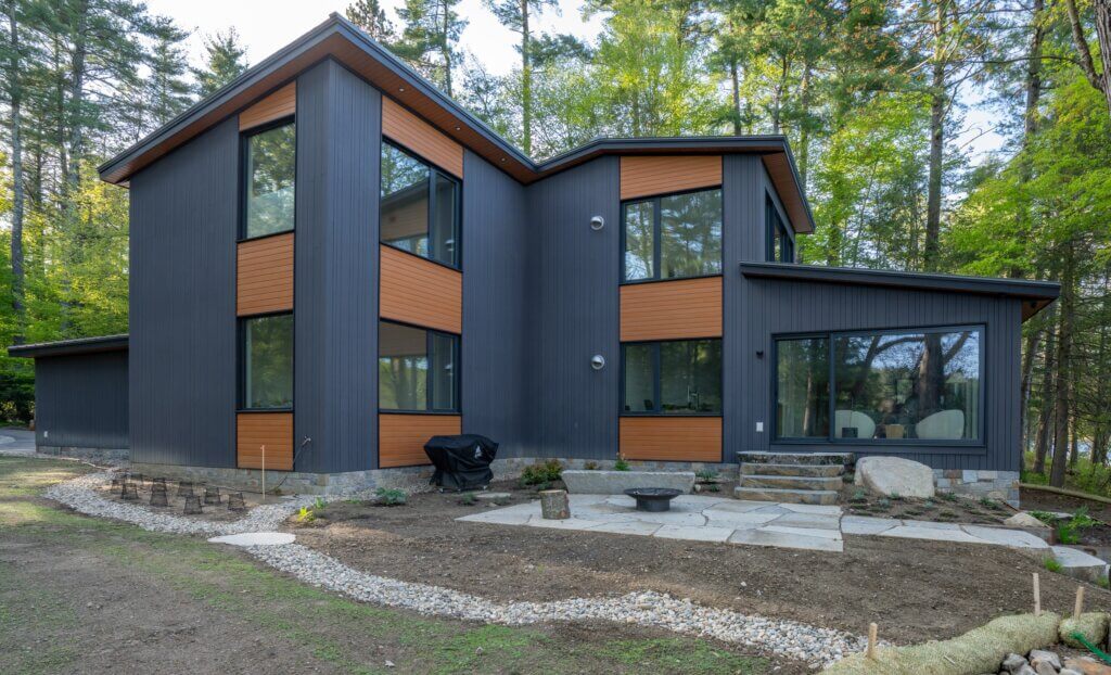 Our design goal was to create an environmentally friendly, calm and cozy space with a strong visual connection to our natural surroundings. Sustainable building materials (fly ash vertical siding, rice hull horizontal siding, aluminum roof, bamboo cabinetry), geothermal heating and cooling, hyperinsulation and sealing make this a home that is good for our planet. We are thrilled to be living here and being part of the Acton community.