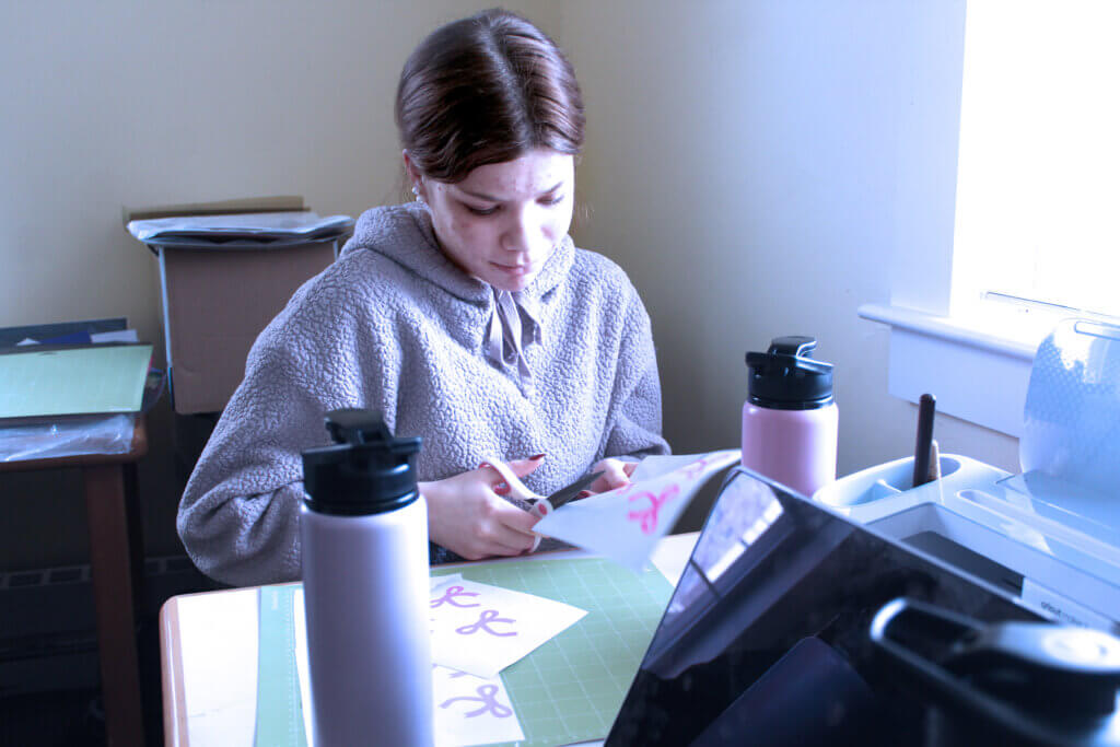Ana Armocida works on products for Acton PossAbilities. Photo: Laura Hayes/Acton Bridge