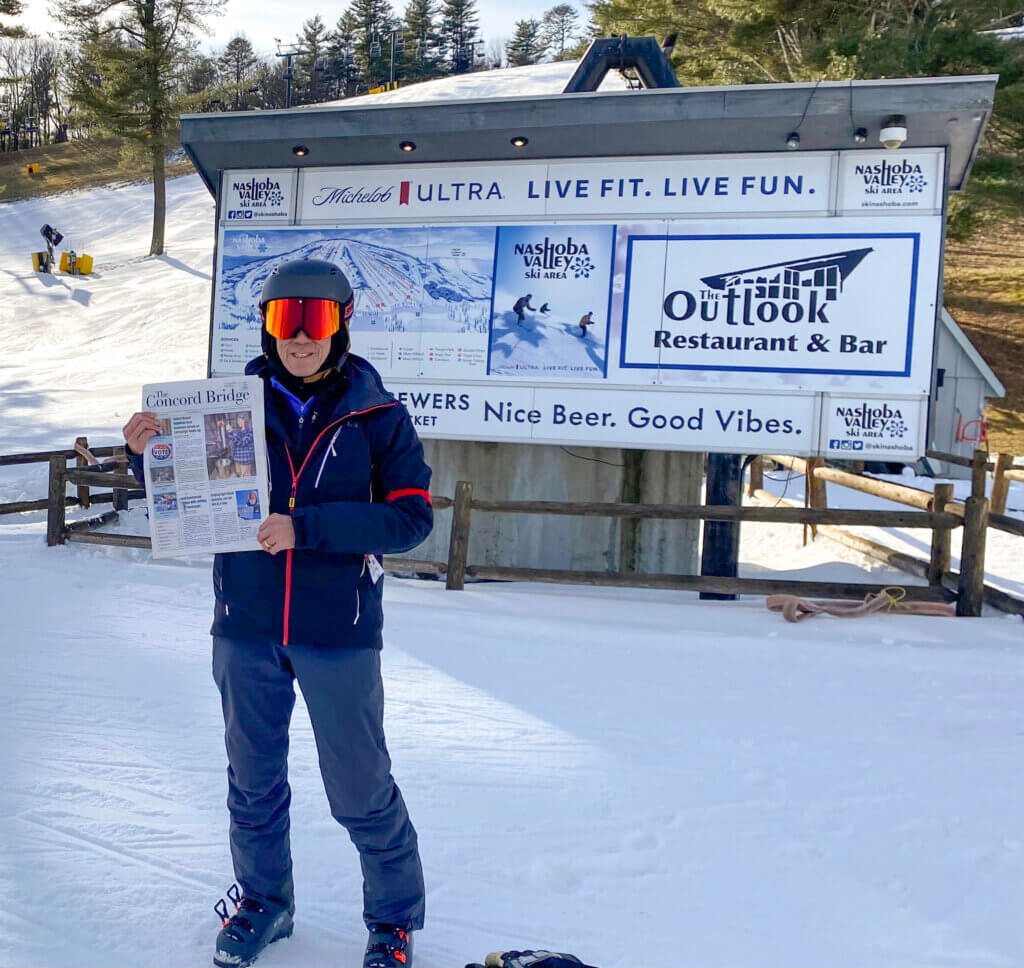 Chesley Chen at Nashoba Valley on December 20, 2025, holding a copy of The Acton Bridge with his photo on the cover. Courtesy photo
