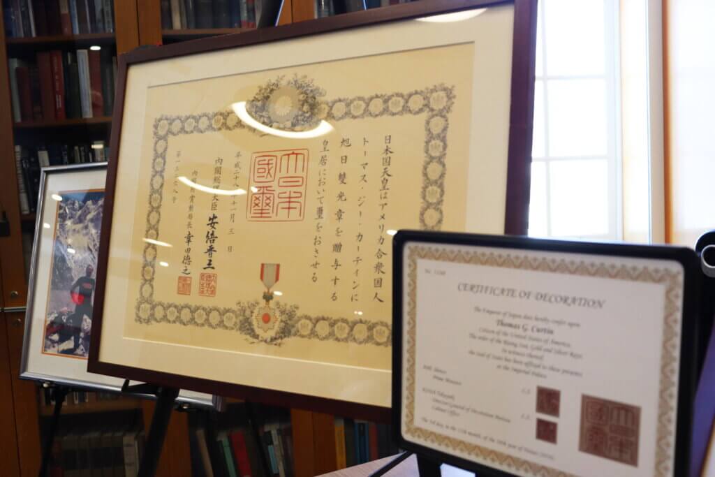 Tom Curtin, a founding member of the Acton Nanae Network, received the Order of the Rising Sun with Gold and Silver Rays in 2016. Photo: Trace Salzbrenner/The Acton Bridge