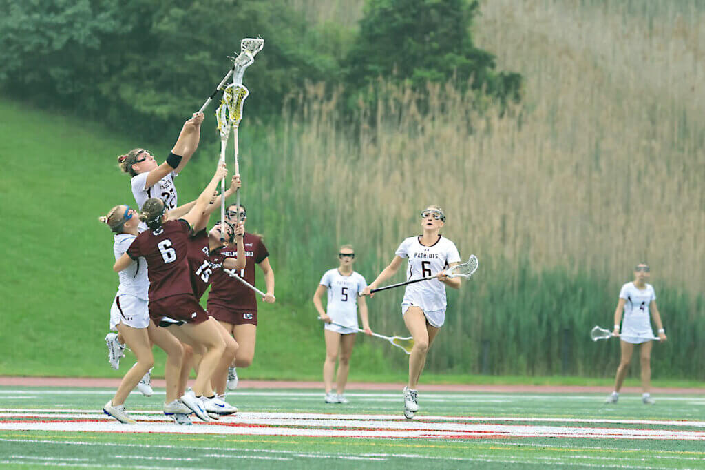 Karleigh Mutch is airborne in the Patriots 13-6 victory over Chelmsford on Tuesday. Photo by Janel Apuna