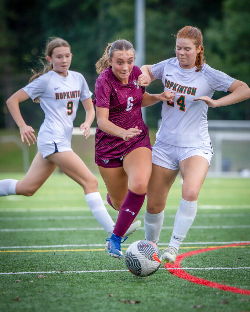 The Patriots’ Cami Cox battles for possession in the Pats’ 5-0 win over Hopkinton on September 30. Photo by Janel Apuna