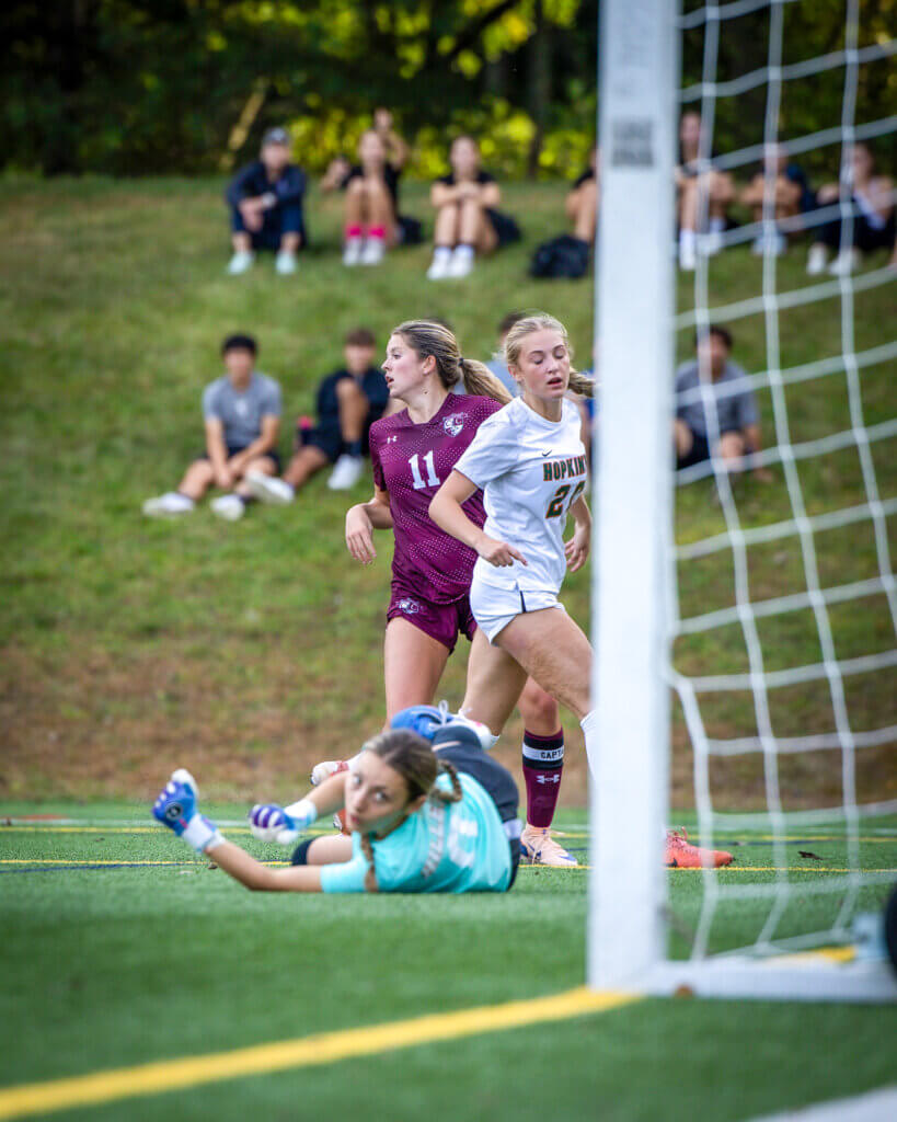 Co-captain Emmy O’Donnell (No. 11) scores one of her three goals against Hopkinton on September 30. Photo by Janel Apuna