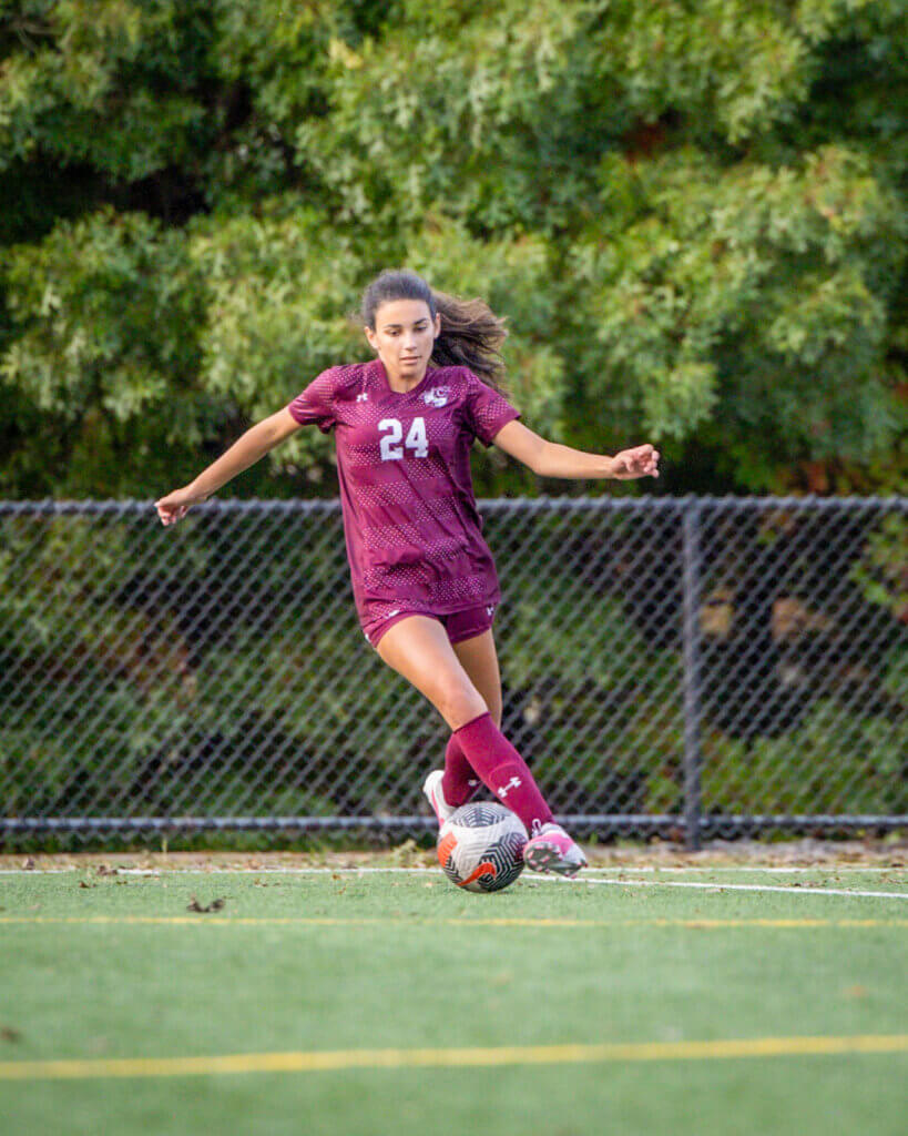 Paige DiPerna looks to pass to a CCHS teammate. Photo by Janel Apuna