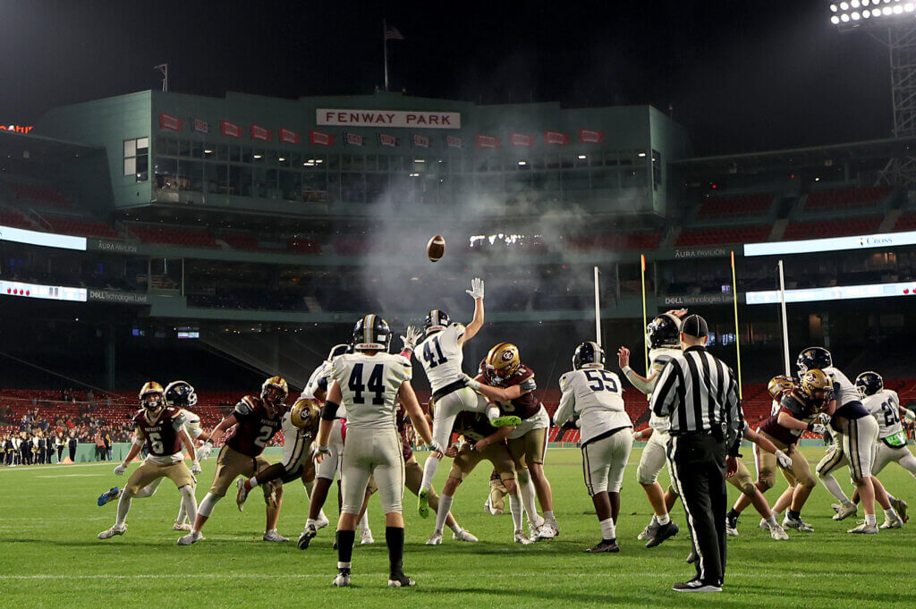 With smoke still thick in the air from a musket volley, Acton-Carlisle tries for the extra point.