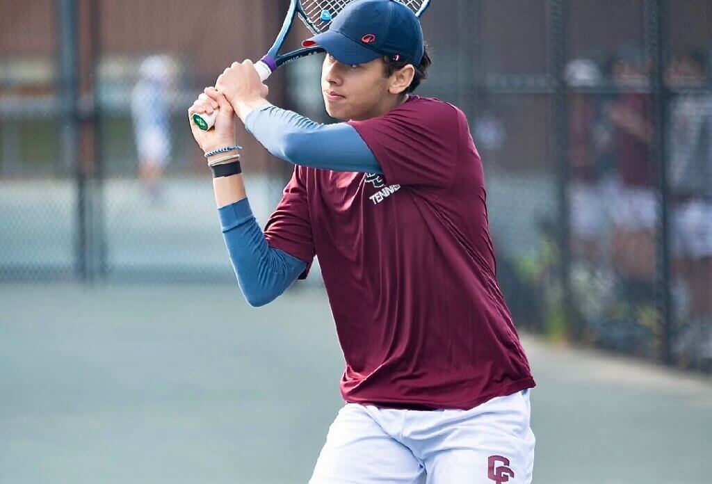 Pedro Nachbin rolled to a 6-0, 6-0 sweep in his first singles match, May 8 at Wayland. Photo by Alexis Guinebertiere
