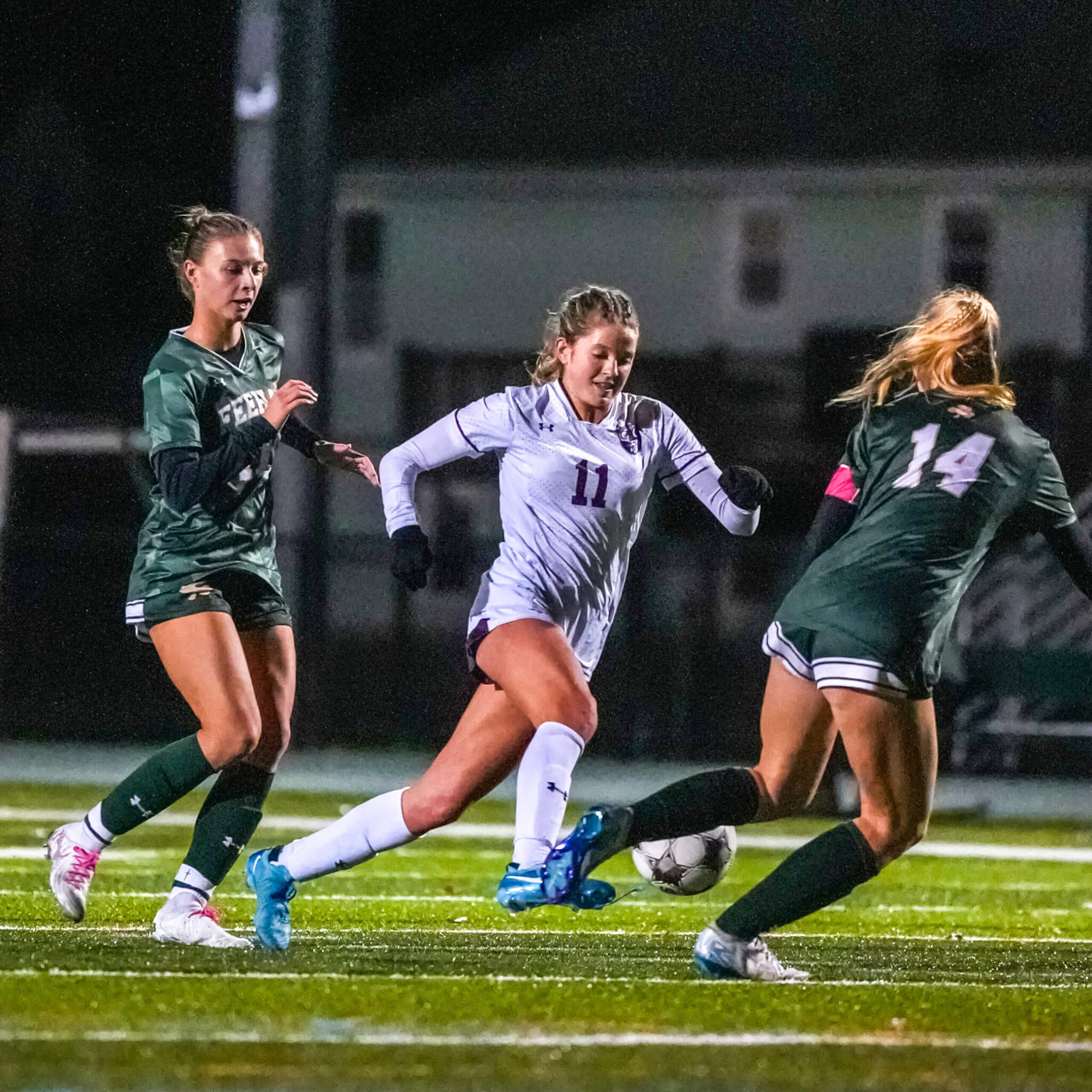 Emmy O'Donnell (No. 11) charges upfield. Photo by Aidan Moroney