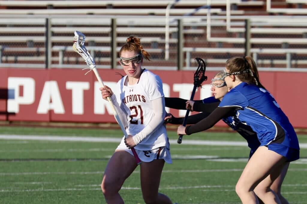 Julia Reynolds seeks an opening against the Bedford defense. Photo by Jason Fortier