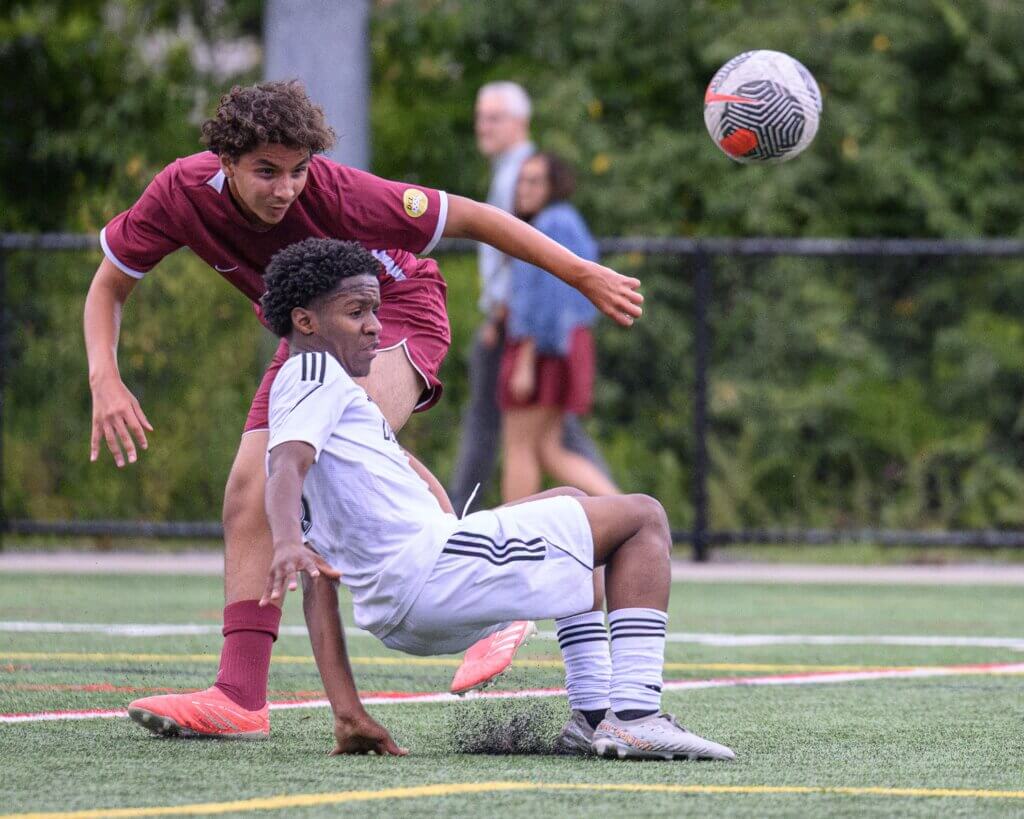 Rayan Boutrig scores the Patriots’ game-winning goal in the second half against Dearborn STEM Academy. Photo by Jon Straggas