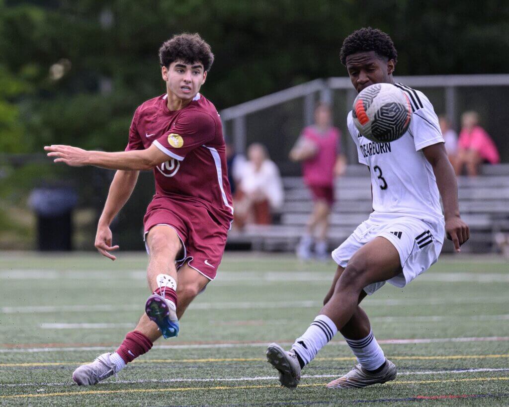 The Patriots’ Adrian Avini fires a second-half shot on goal against Dearborn STEM Academy. Photo by Jon Straggas