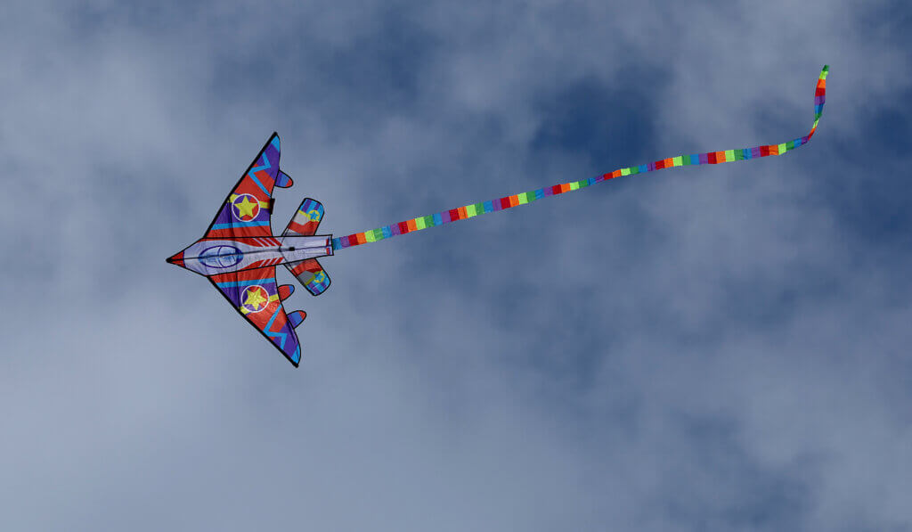 A kite in the shape of an airplane soards above Rideout Park in West Acton during the Acton Recreation Department’s Kite Festivalon Saturday, May 2, 2026. Ken McGagh/The Acton Bridge