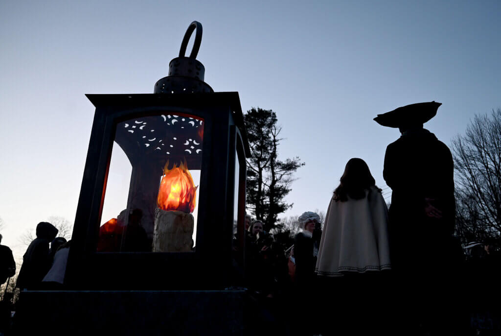 The Concord250 lantern is illuminated during a ceremony at the Acton Museum. Photo: Ken McGagh/The Acton Bridge

