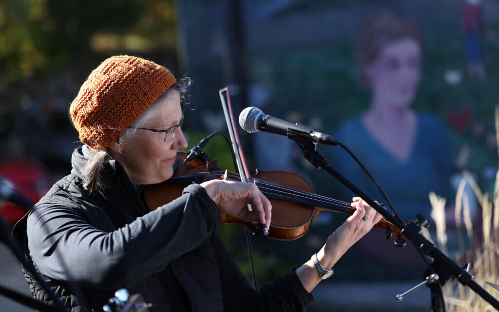 Kristin Moore of Acton, one half of Due West, plays her violin in front of Acton Teacakes during Discover West Acton Day on Saturday, October 18, 2025. Ken McGagh/The Acton Bridge