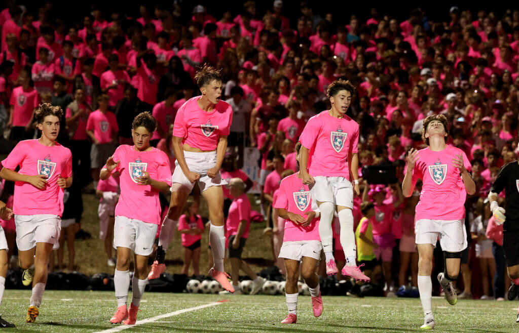 The Acton-Carlisle boys’ soccer team gets pumped before taking on Lincoln-Sudbury in Saturday night’s final.
