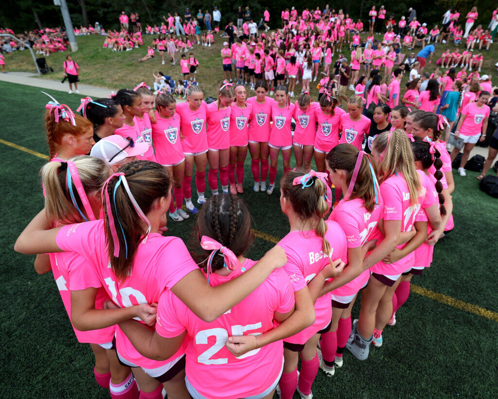 The Patriots huddle before taking on L-S during the 19th annual Lois Wells Memorial Kicks for Cancer tournament at CCHS. 
