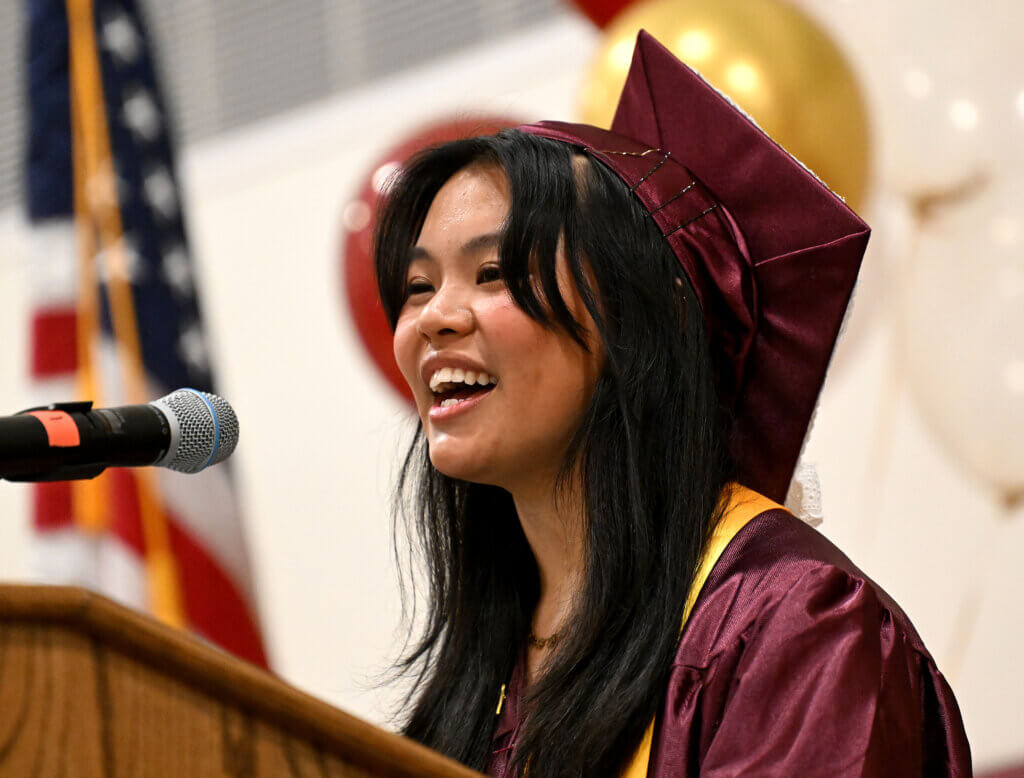 Senate Moderator Veronica Moy addresses the commencement audience in the CCHS gymnasium.  Photo: Ken McGagh/The Acton Bridge 
