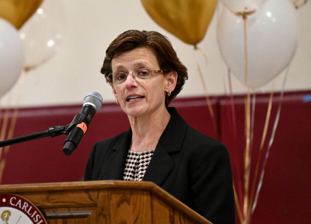 Schools Superintendent Laurie Hunter addresses the graduates. Photo: Ken McGagh/The Acton Bridge 
