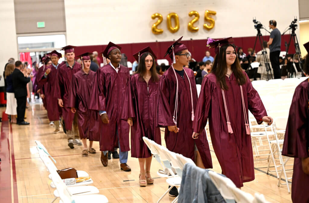 Seniors file into the CCHS gym. Photo: Ken McGagh/The Acton Bridge 

