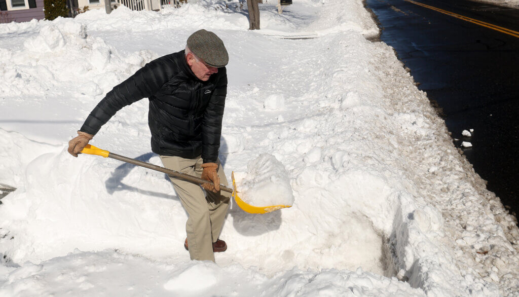 George Tisdale, 83, digs out of his Commonwealth Ave home one day after the Blizzard of 2026 on Tuesday, February 24. Photo: Ken McGagh/The Acton Bridge