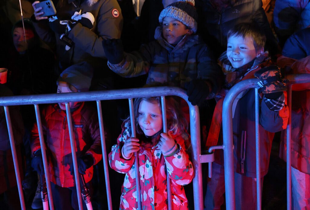 Children watch the parade during the town’s annual Tree Lighting on Sunday, December 7, 2025. Ken McGagh/The Acton Bridge