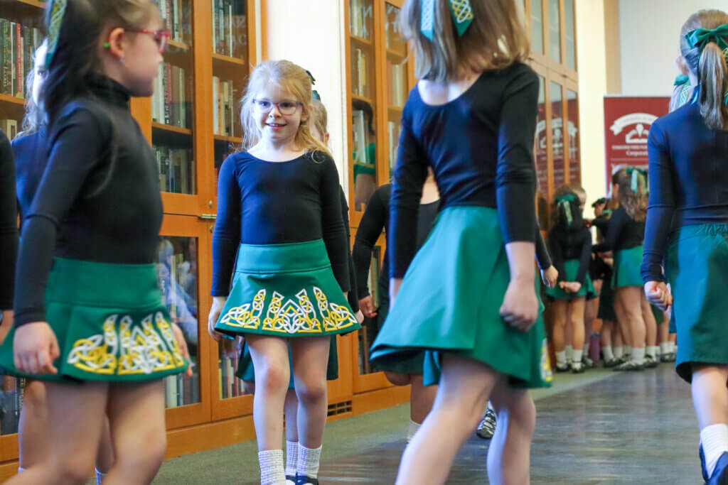 Welles Turner, center, performs the traditional Irish piece, “The Sweets of May.” Photo: Trace Salzbrenner/The Acton Bridge