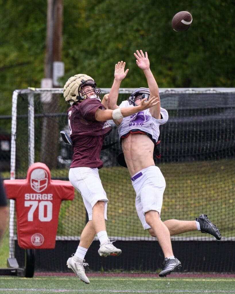Henry Jackson battles a Shawsheen Tech opponent for the ball. Photo by Jon Straggas