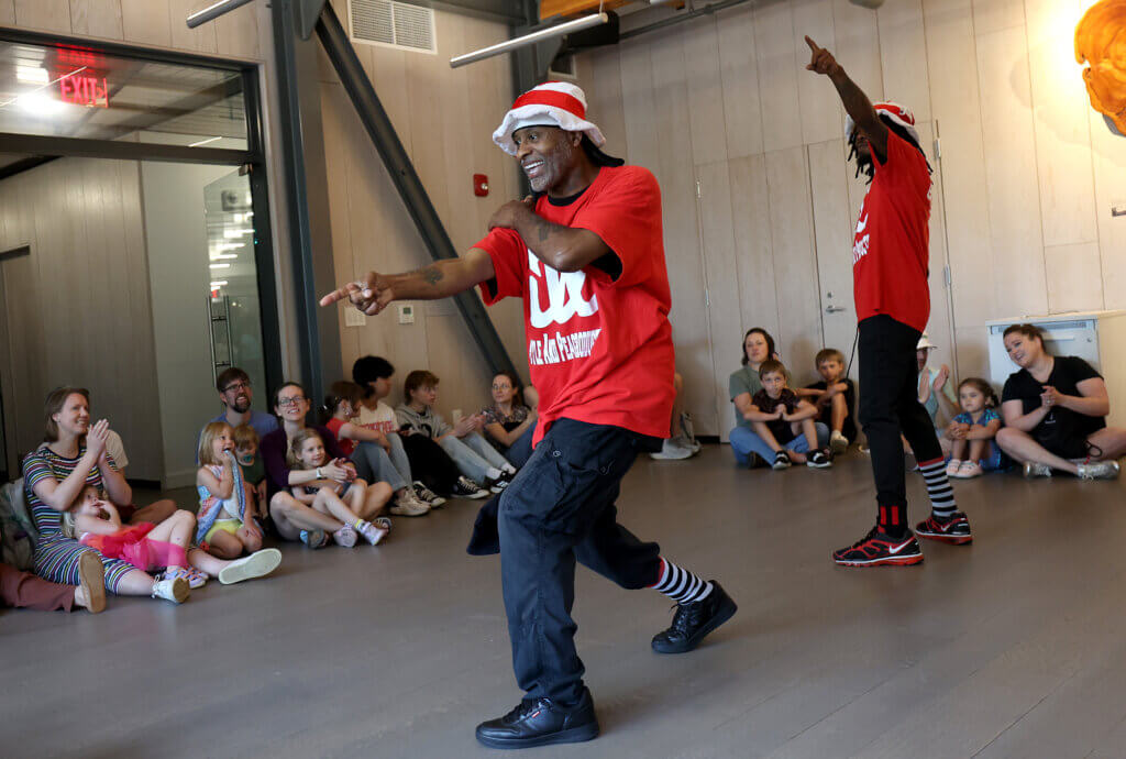 Brandon “Peace” Albright, left, and partner “Buzz” of Illstyle & Peace Productions, entertain children and adults.  
