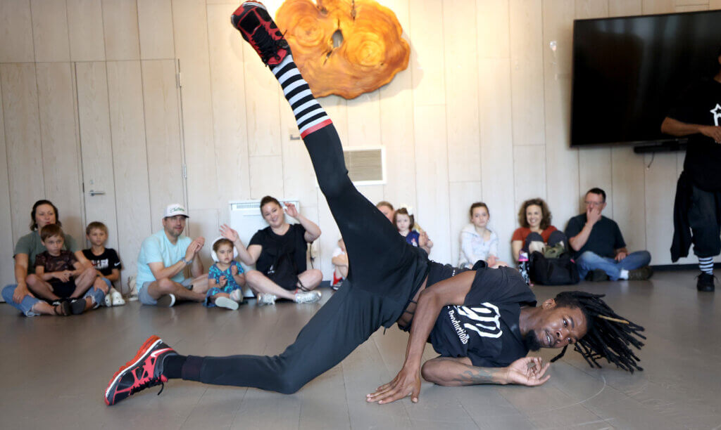 “Buzz,” a dancer with Philadelphia-based Illstyle & Peace Productions, showcases his breaking moves.